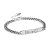 Ciondolo creativo con faccina sorridente su una catena cubana vintage in argento 925, stile streetwear urbano unico.