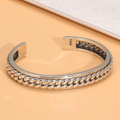 Sterling silver bangle bracelet with Cuban chain shape, this is a front view of sterling silver bangle