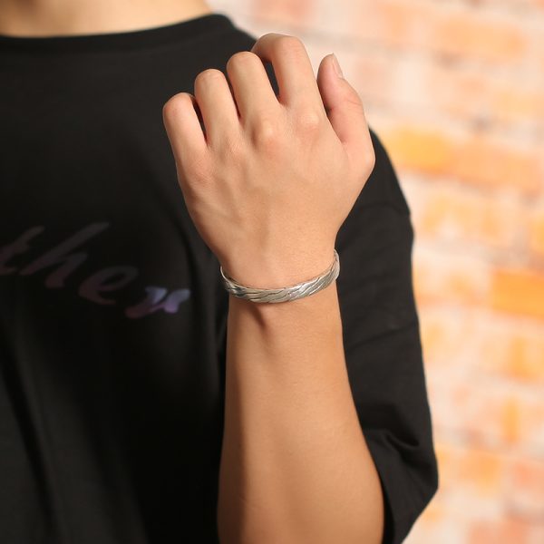 Silver bangles bracelets with twisted Open cuff, this is a wear view of the sterling silver bangle
