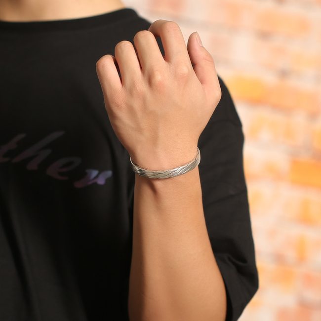 Silver bangles bracelets with twisted Open cuff, this is a wear view of the sterling silver bangle