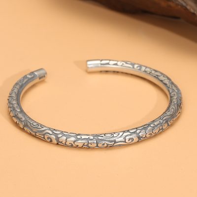 Sterling Silver Bangle Bracelet with Clouds Cuff, Using Thai silver craftsmanship, clouds are carved throughout the entire sterling silver bracelet.