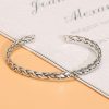 Sterling silver bangle bracelet, narrow braided open cuff bangle, this is a front view of silver bangle