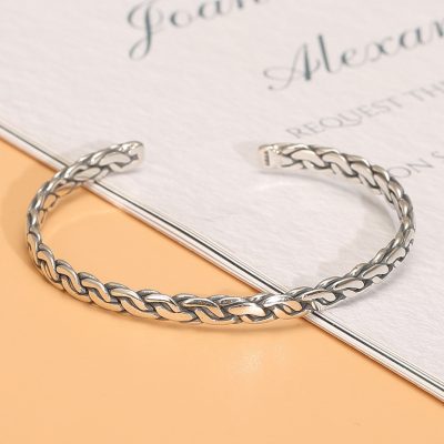 Sterling silver bangle bracelet, narrow braided open cuff bangle, this is a front view of silver bangle