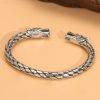 Sterling silver bangle bracelet, with twin dragon head design at the open ends