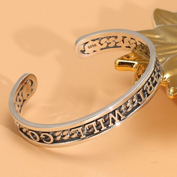 sterling silver bracelet for charms, right view of the silver bracelet, engraved with the phrase “MY HEART WILL GO ON” on top