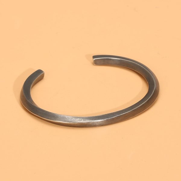 sterling silver twisted bangle bracelet, crafted from 4×4 mm square silver bars twisted