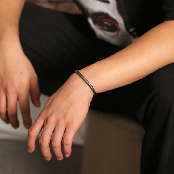 sterling silver twisted bangle bracelet, this is a wear view of sterling silver bangle