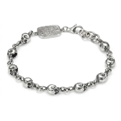 Biker-style 925 silver bracelet with detailed skull links, handcrafted in authentic Thai silver.