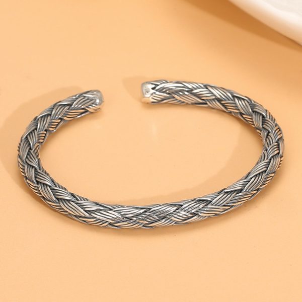 sterling silver charm bracelet vintage, front view of the silver bangle