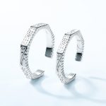 Anillos de pareja modernos geométricos de plata facetada
