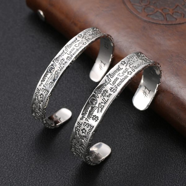 vintage sterling silver bangle bracelets, the surface of the bracelet is engraved with various characters.