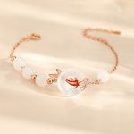 Pulsera de plata de ley con calcedonia blanca y carpa