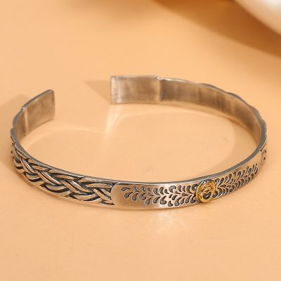 Sterling Silver Bangle Bracelet Of Braided Textured