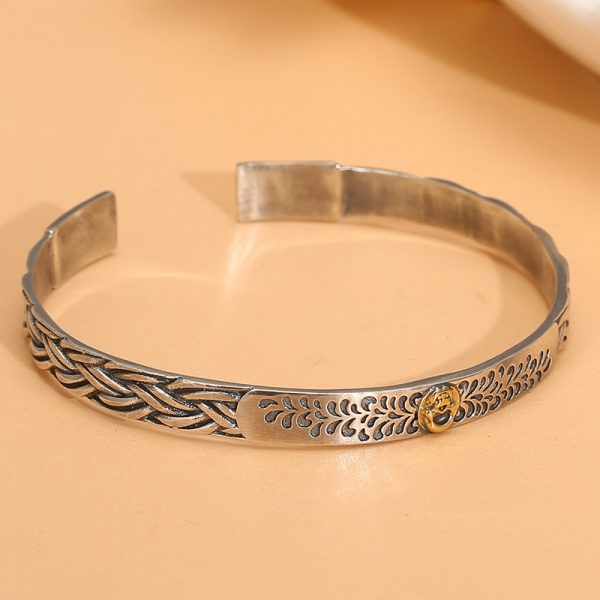 Sterling Silver Bangle Bracelet Of Braided Textured
