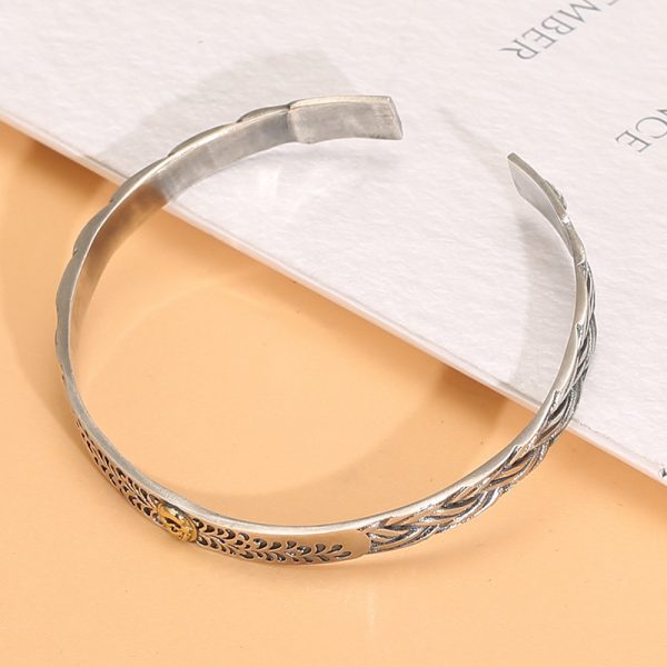 Sterling Silver Bangle Bracelet Of Braided Textured Left view