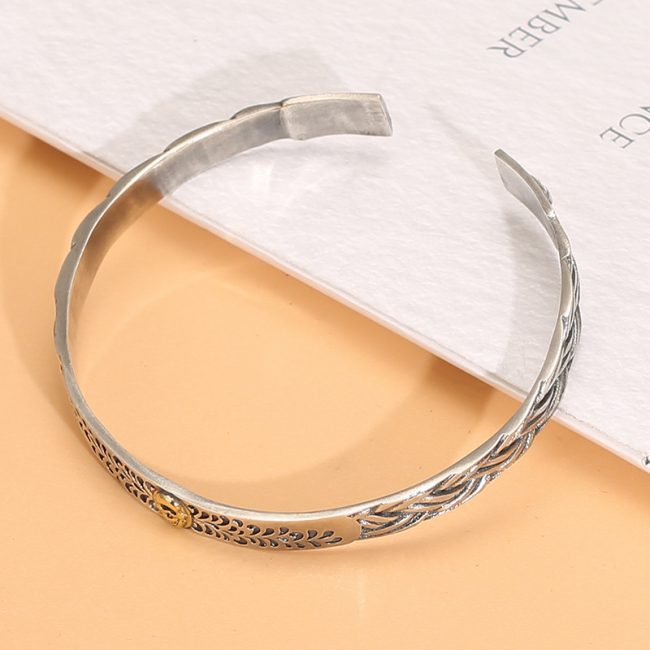 Sterling Silver Bangle Bracelet Of Braided Textured Left view