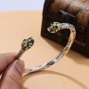 Sterling Silver Bangle Bracelet Of Twistd Skull Cuff Top View