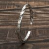 Sterling silver bangle bracelet, wear view of the bangles twisted silver bracelet of detail