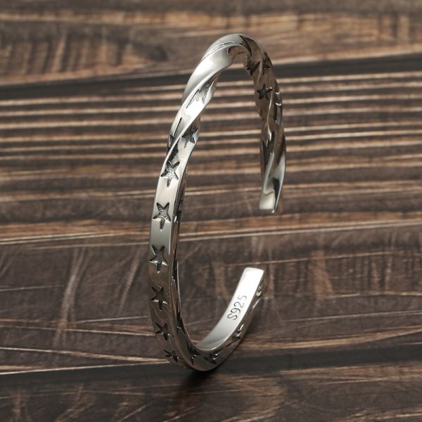 Sterling silver bangle bracelet, wear view of the bangles twisted silver bracelet of detail