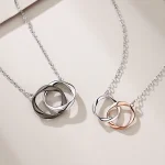 Collar de pareja de plata con colgante de Mobius