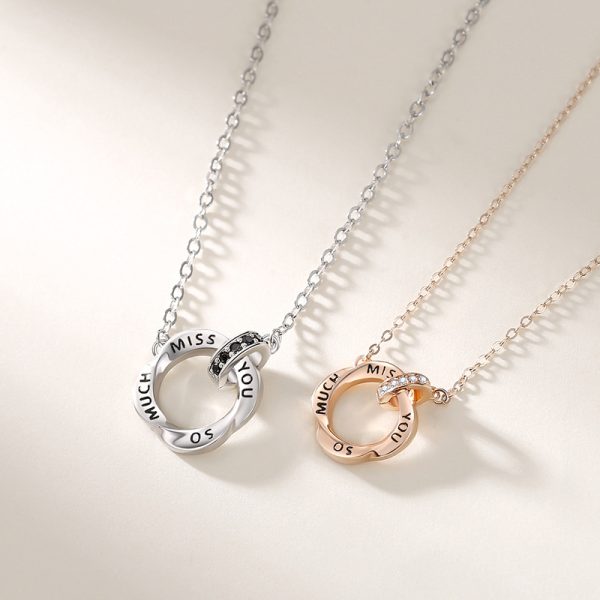 Silver Couple Necklace With Mobius Strip Pendant Detail View