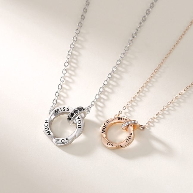 Silver Couple Necklace With Mobius Strip Pendant Detail View