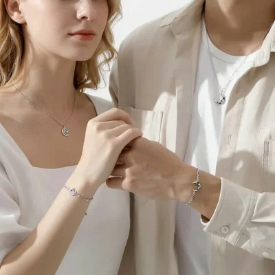 Romantic gift view: Couple wearing Prince and Rose silver jewelry