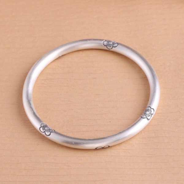 Sterling Silver Bangles of Carved Flowers detail view