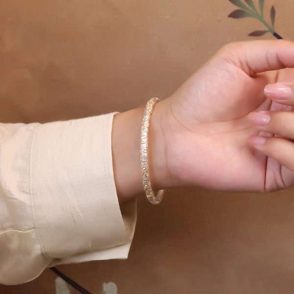 women wear 999 Sterling Silver Cherry Blossoms Carved Bangle, silver bangle weight about 26 - 29g,