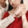 Four-Leaf Clover Heart Knot Silver Couple Bracelets, couple wear bracelet view, It means that couples will always be together and never leave each other.