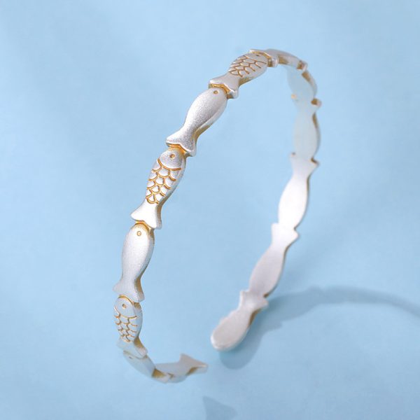 sterling silver bangle bracelet with small fish