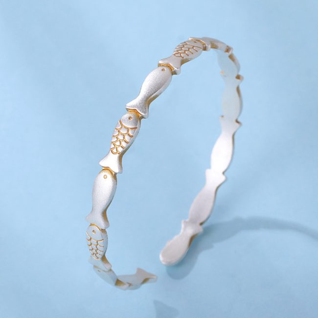sterling silver bangle bracelet with small fish