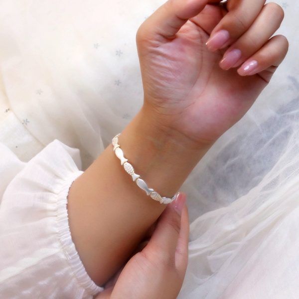 sterling silver bangle bracelet with small fish