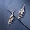 Pendientes colgantes retorcidos de plata de ley 925