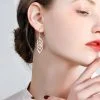 Pendientes colgantes de plata trenzados a mano para mujer