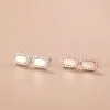 Pendientes de diamantes ovalados de plata de ley