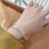 Pulsera doble de trébol de cuatro hojas y bambú (video en miniatura)