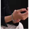 Men's heavy braided sterling silver chain bracelet with vintage Thai silver craftsmanship.