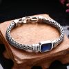 Pulsera de plata de ley 925 con circonita azul.