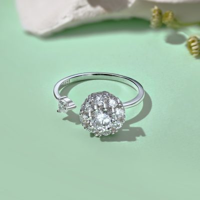 Gold plated sterling silver rings for women featuring a spinning sunflower design with a large central zirconia and 8 smaller stones.