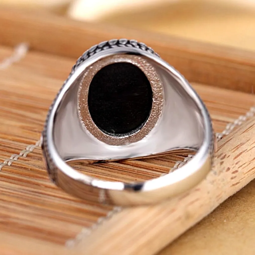 Arabesque engraved silver signet ring