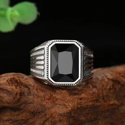 Modern men's silver signet ring with black stone